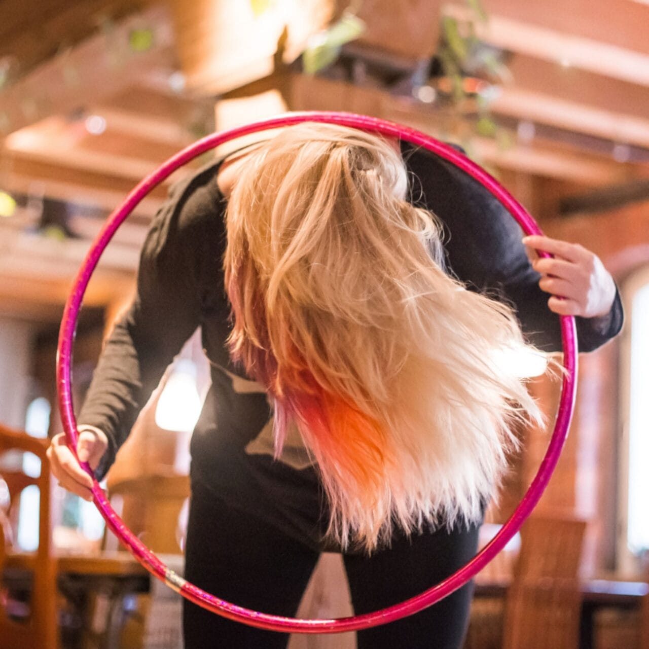 Girl playing hula hoop and having fun