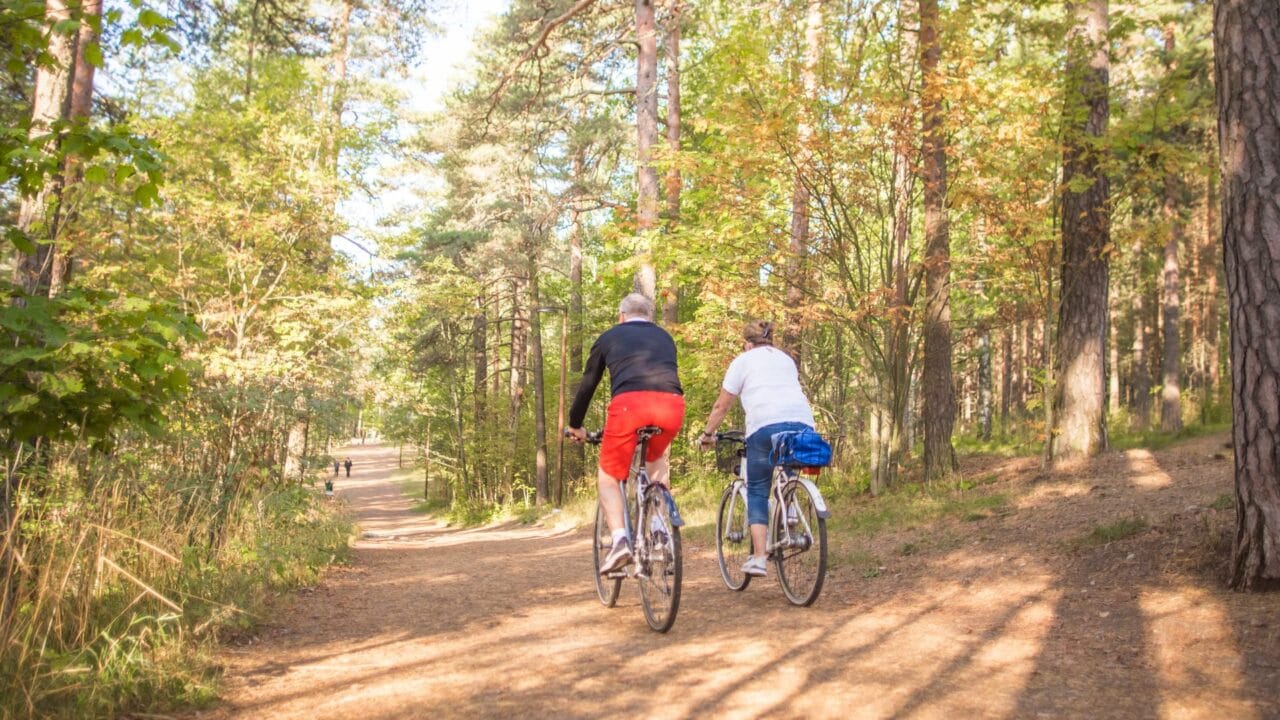 People biking on the nature trail.
