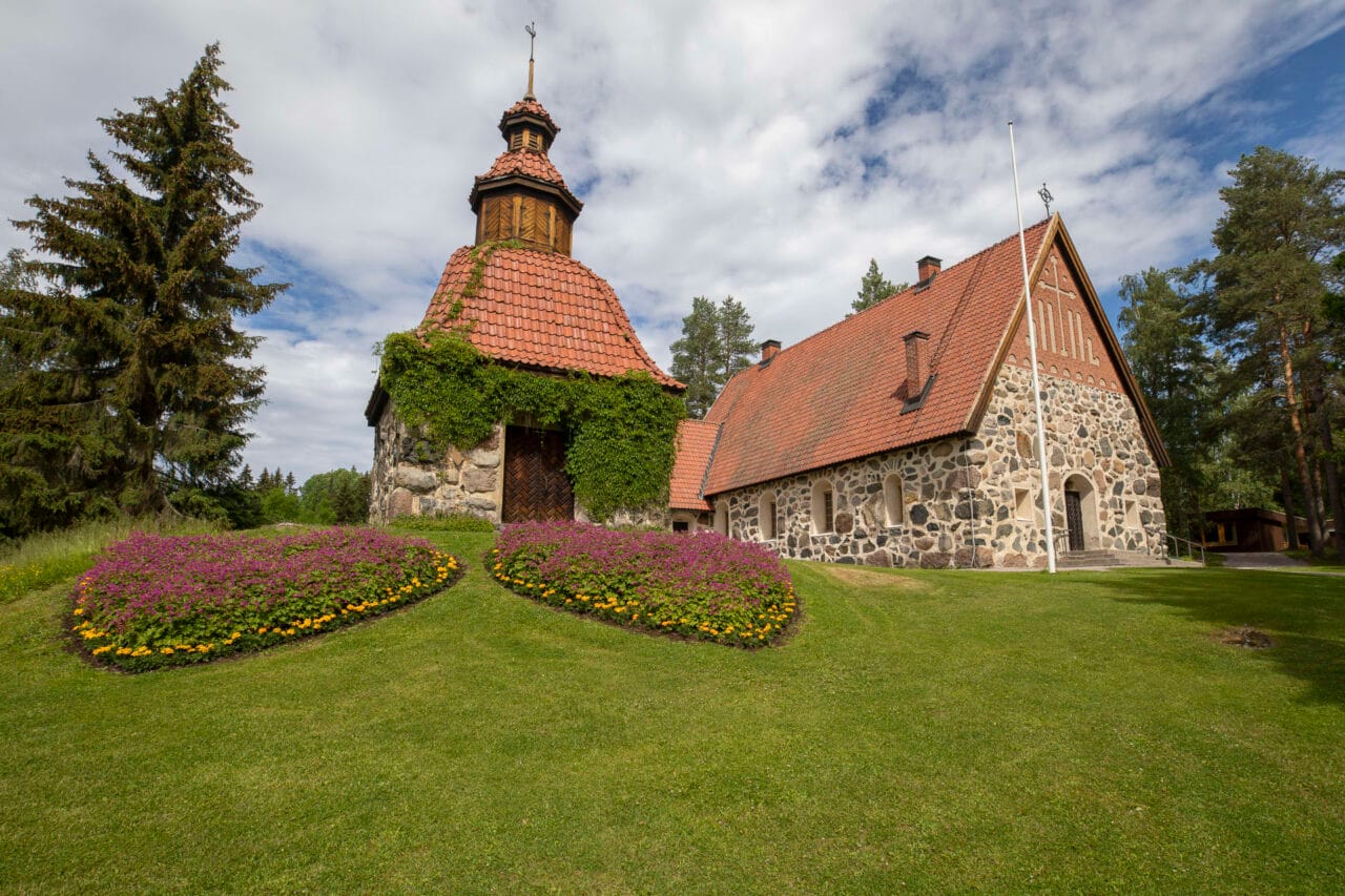 Medieval style church with red tiled roofing.