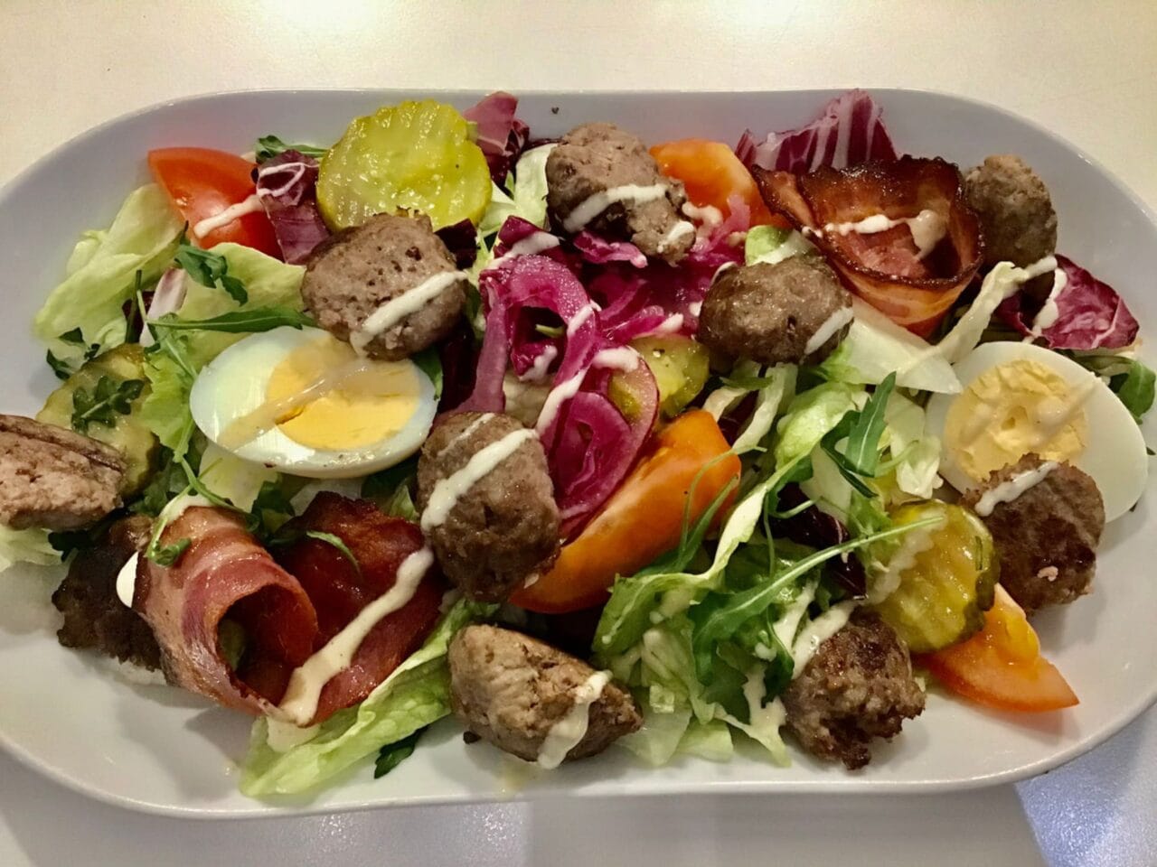 Salad with local meatballs