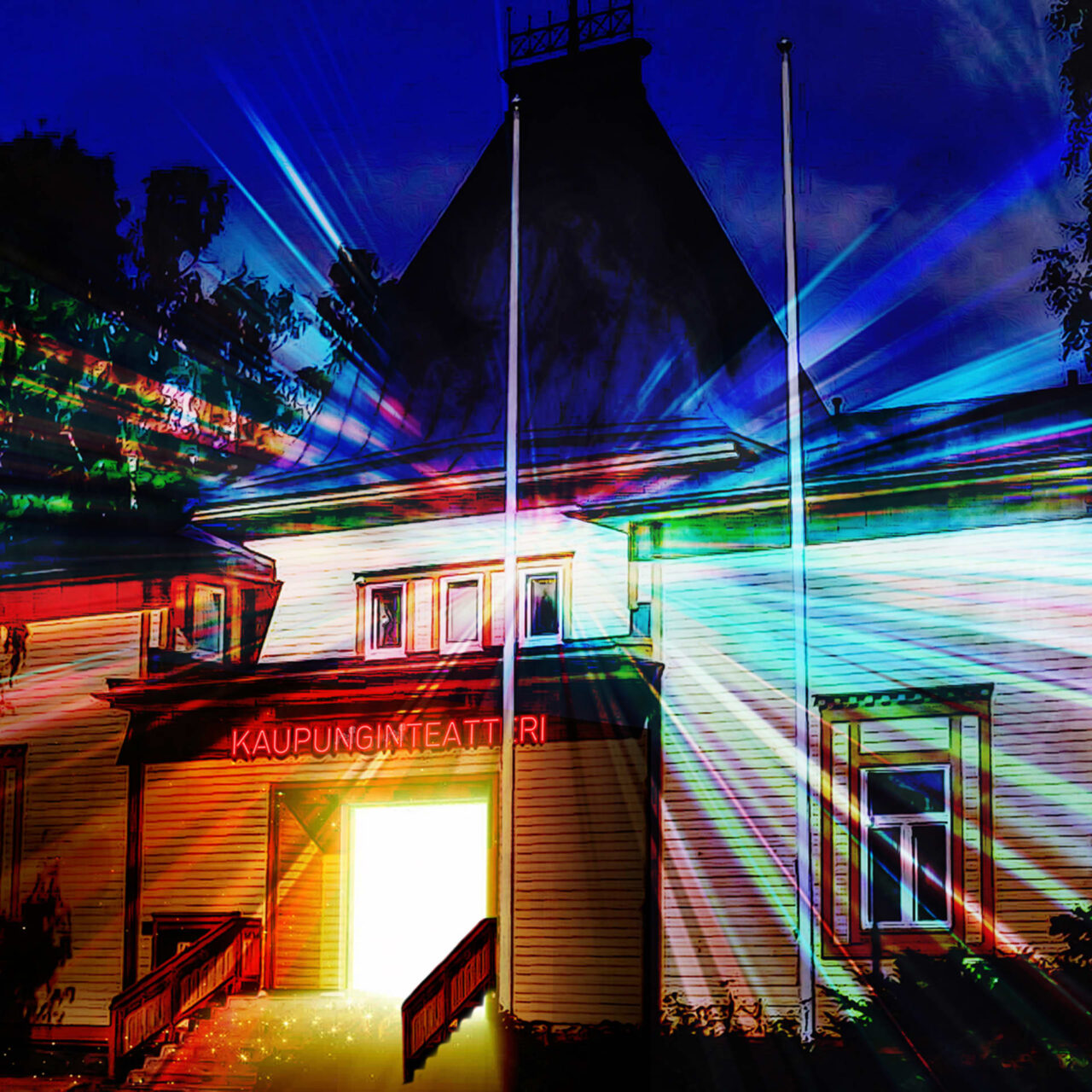Valkeakosken kaupunginteatterin rakennus värivalojen loisteessa.